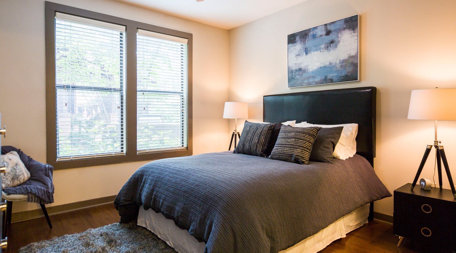 Bedroom with natural lighting and high ceilings